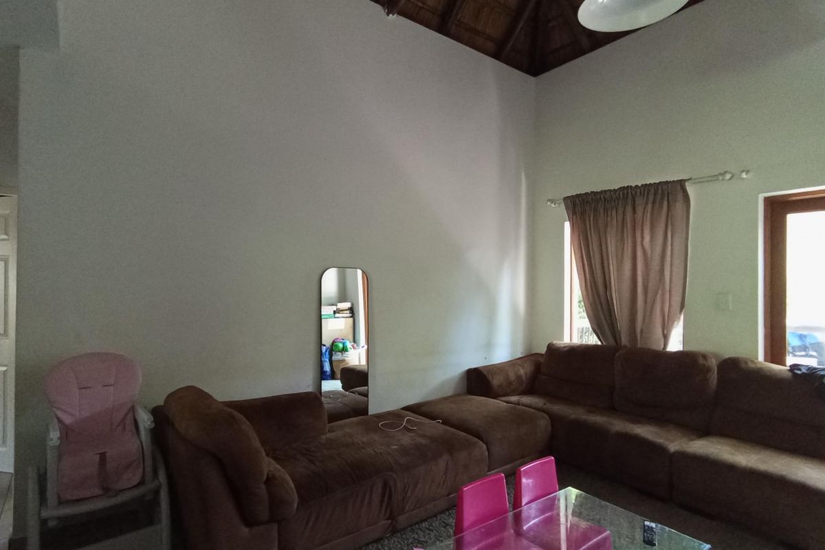 Comfortable living in secure complex - Photo 2