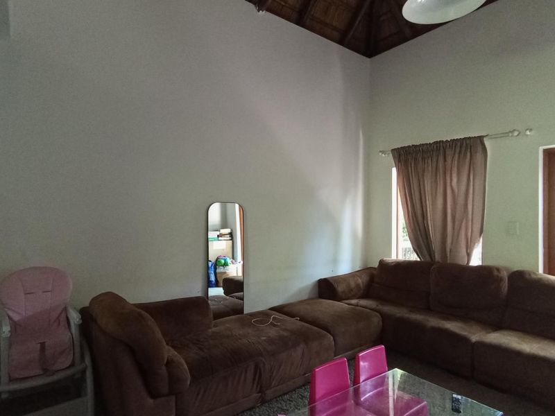Comfortable living in secure complex - Photo 2