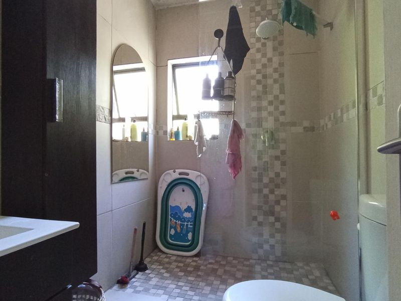 Comfortable living in secure complex - Photo 10