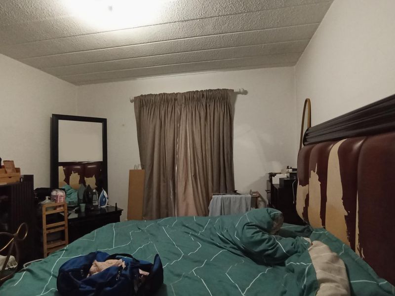 Comfortable living in secure complex - Photo 6