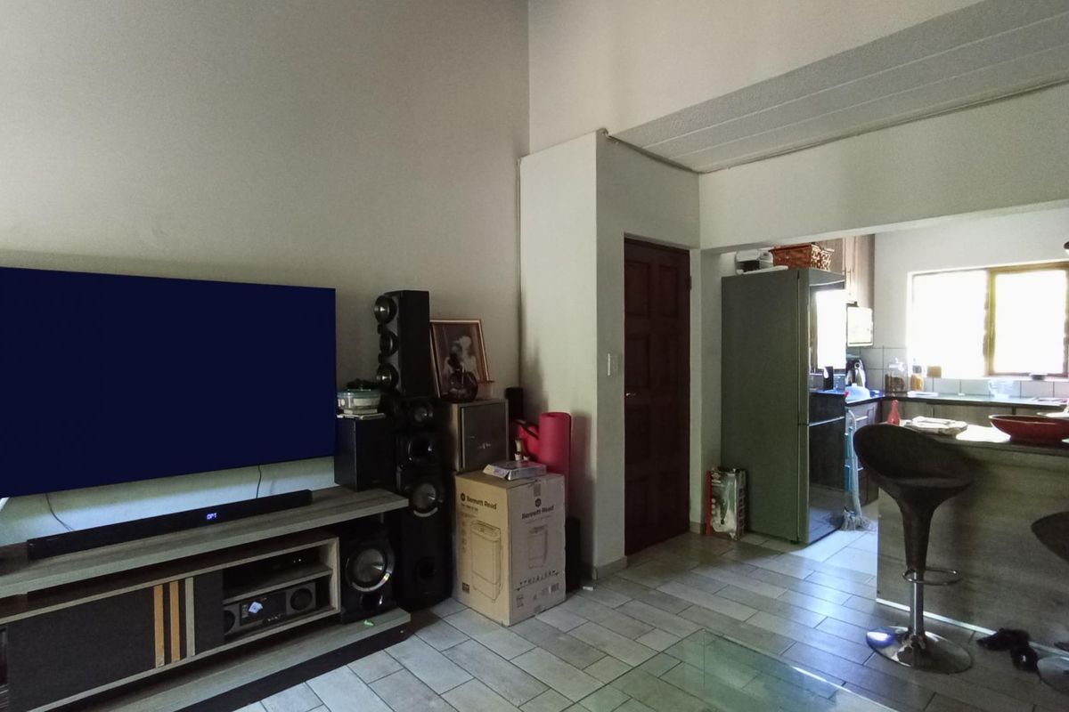 Comfortable living in secure complex - Photo 3