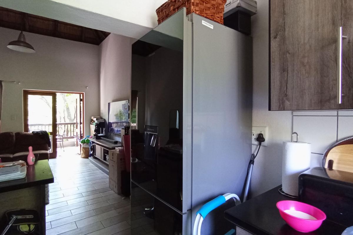 Comfortable living in secure complex - Photo 5