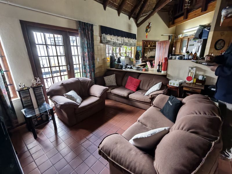 Thatch Roof Charm Meets Practical Family Living - Photo 4