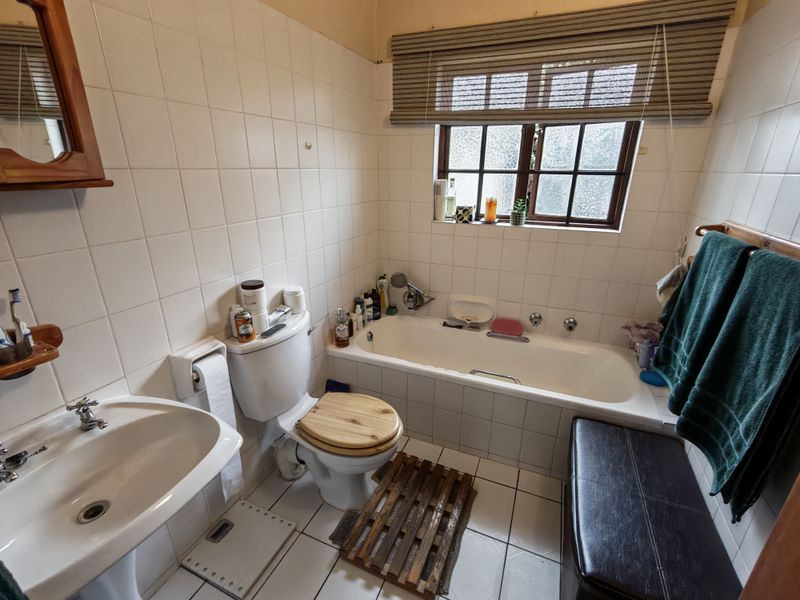 Thatch Roof Charm Meets Practical Family Living - Photo 9