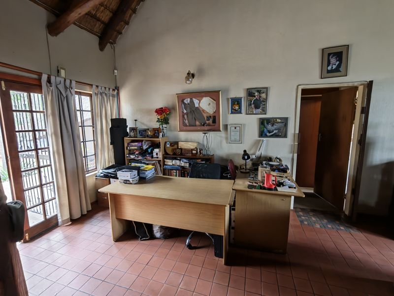 Thatch Roof Charm Meets Practical Family Living - Photo 3
