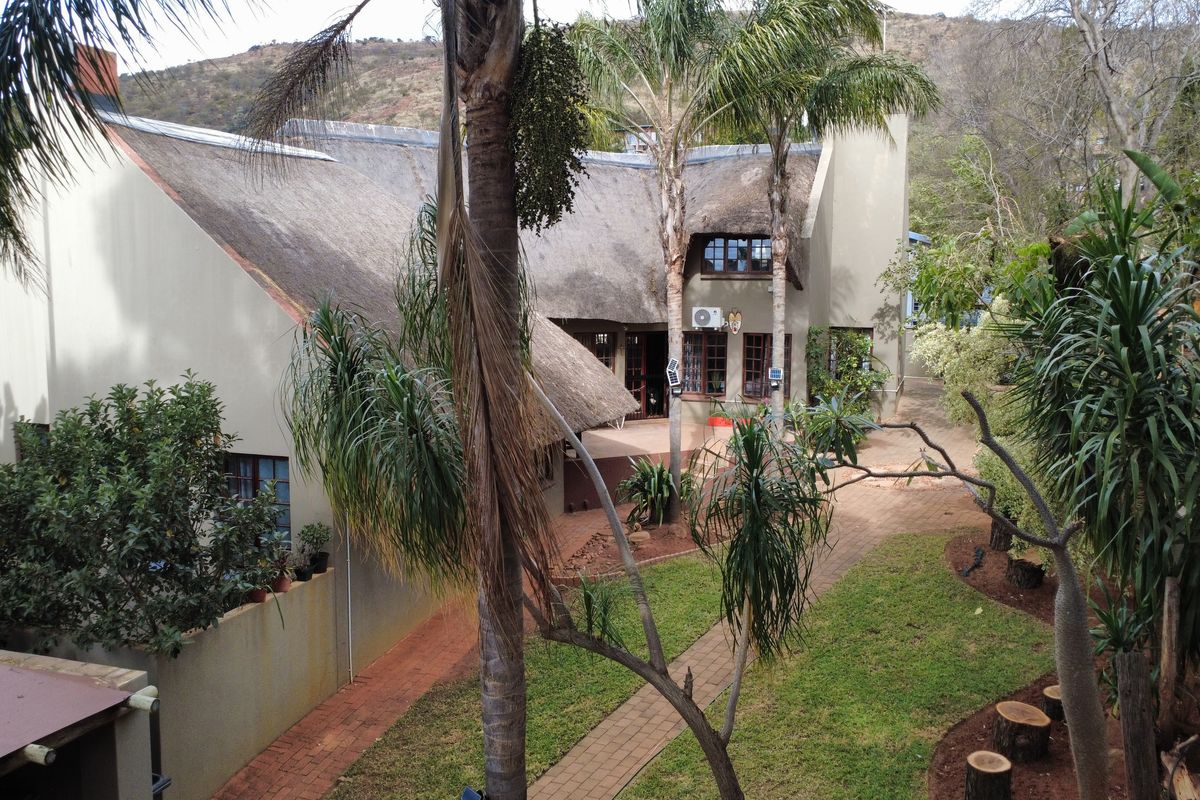 Thatch Roof Charm Meets Practical Family Living - Photo 2