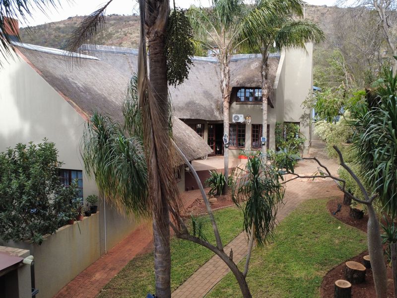 Thatch Roof Charm Meets Practical Family Living - Photo 2