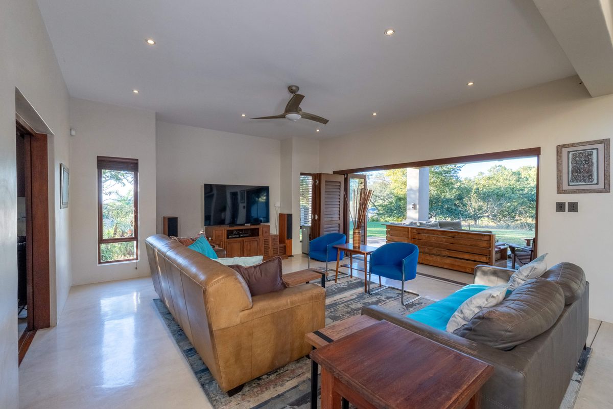 Own this sought after luxury property bordering on the greenbelt and calming stream - Photo 3