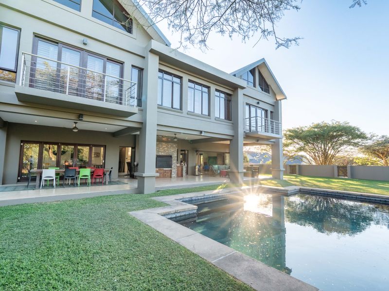 Own this sought after luxury property bordering on the greenbelt and calming stream - Photo 7