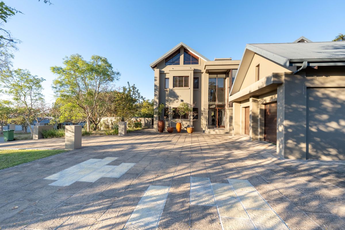 Own this sought after luxury property bordering on the greenbelt and calming stream - Photo 2