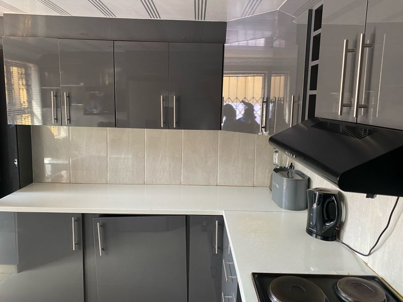 Move in ready with modern touches where it counts. The 4-bed, 2-bath layout is rare at this price. - Photo 8