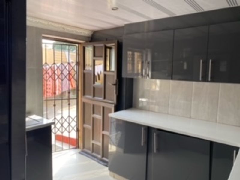 Move in ready with modern touches where it counts. The 4-bed, 2-bath layout is rare at this price. - Photo 6