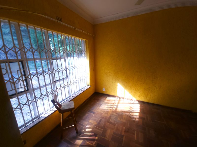 A rare opportunity to secure a large home with versatile living options and incredible potential. - Photo 10