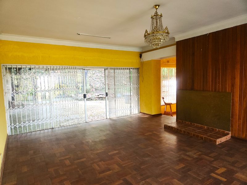 A rare opportunity to secure a large home with versatile living options and incredible potential. - Photo 6