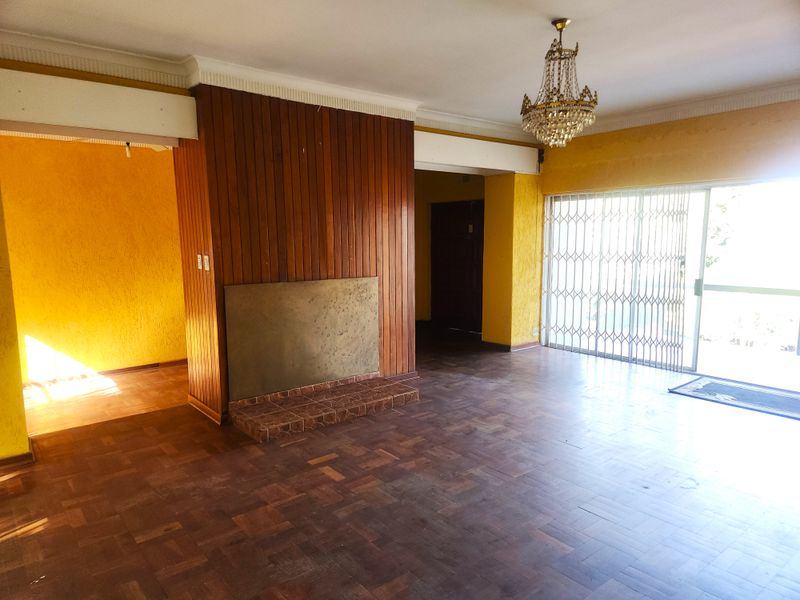 A rare opportunity to secure a large home with versatile living options and incredible potential. - Photo 7