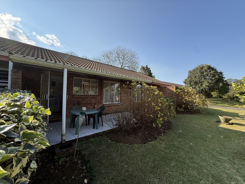 North-Facing End Unit with Space, Privacy and Endless Potential - Photo 1