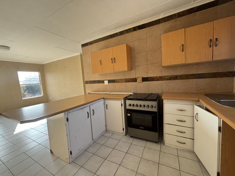 Sectional Title Flat For Sale
