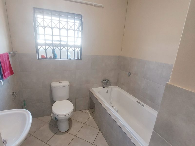 Spacious Family home in secure Area - Photo 9