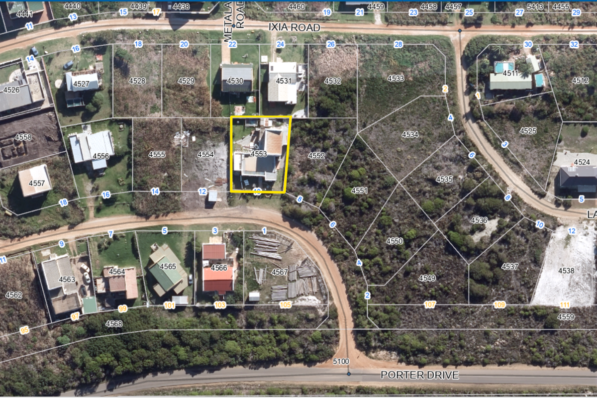 An aerial satellite view showing the property location within the residential neighborhood block.