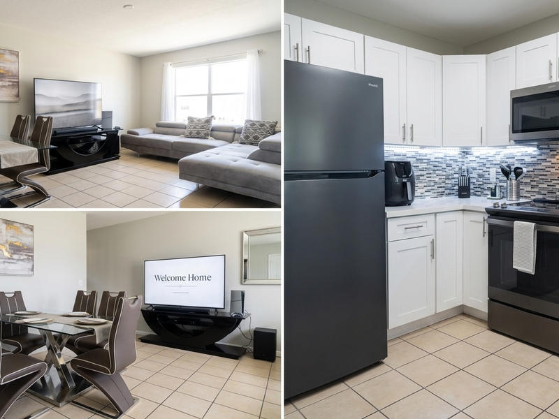 Open plan living and dining area featuring ceramic tile flooring, adjacent to a modern kitchen with white cabinetry, mosaic backsplash, and integrated appliances.