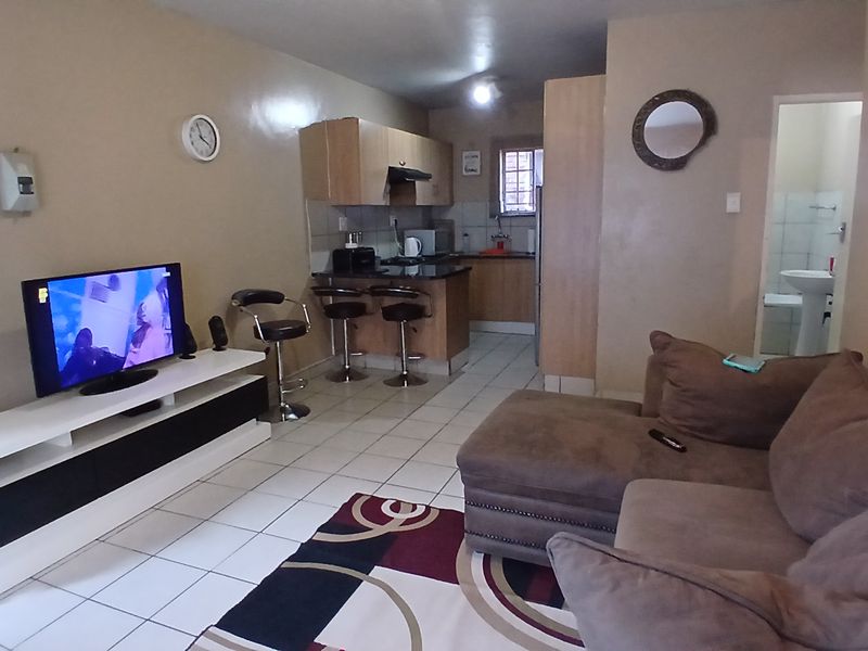 2 bedroom townhouse with lockup garage sale in Kempton Park Ext 1 - Photo 1