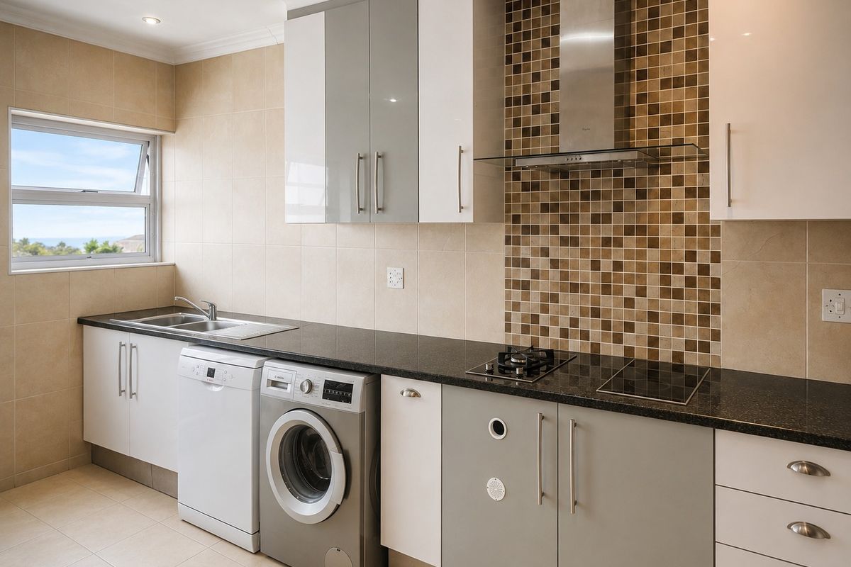 Modern kitchen featuring granite countertops, a mosaic tile backsplash, dual gas and electric hobs, stainless steel extractor fan, and integrated cabinetry.