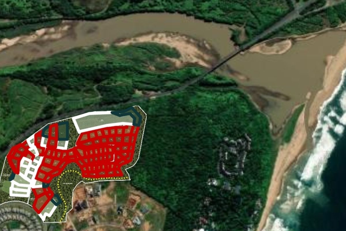 Aerial view showing the layout and positioning of the residential land development in relation to the surrounding coastal landscape.