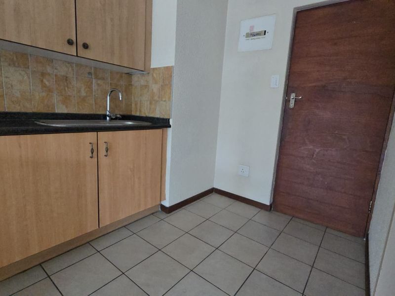 Secure and Convenient Bachelor Living in a Prime Location - Photo 6