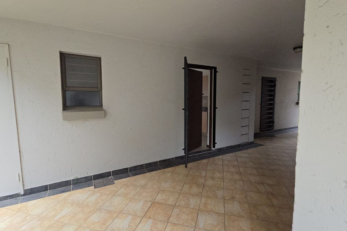 Secure and Convenient Bachelor Living in a Prime Location - Photo 4