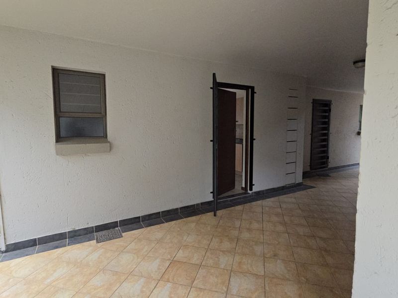 Secure and Convenient Bachelor Living in a Prime Location - Photo 4