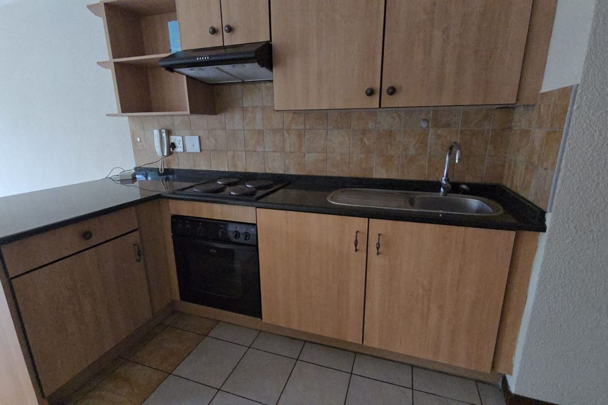 Secure and Convenient Bachelor Living in a Prime Location - Photo 5