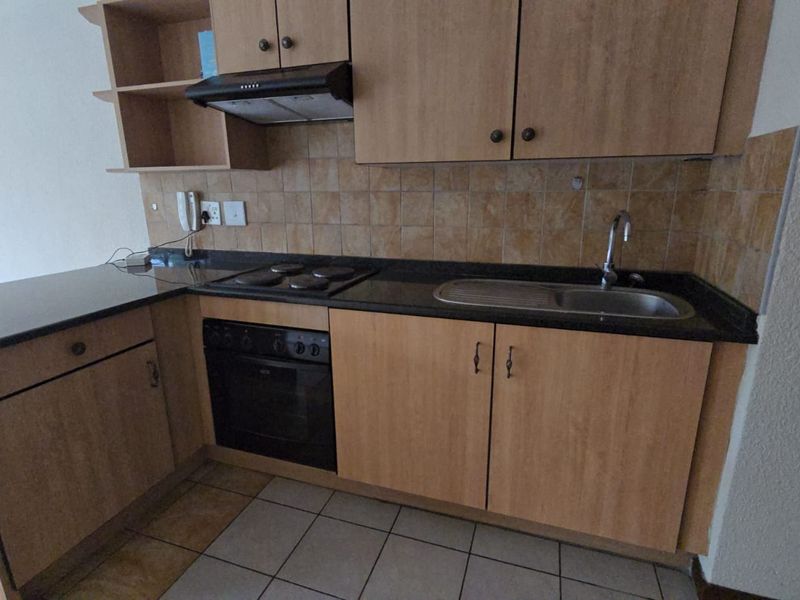 Secure and Convenient Bachelor Living in a Prime Location - Photo 5