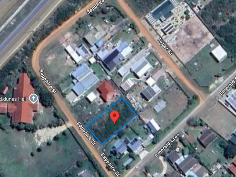 Aerial view of a vacant residential plot located on Sapphire Street, showing the surrounding neighborhood and street access.
