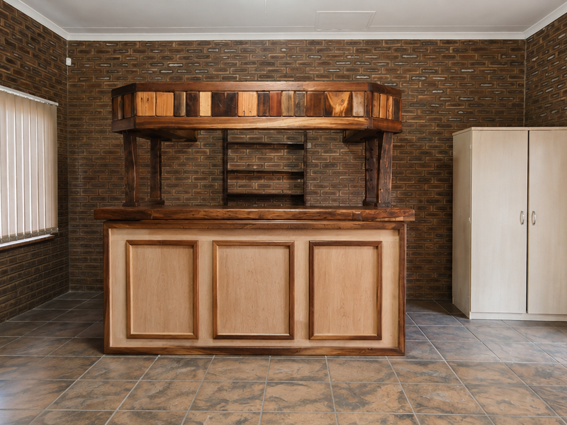 A dedicated bar room featuring rustic brick walls, tiled flooring, and a substantial built-in wooden bar counter.