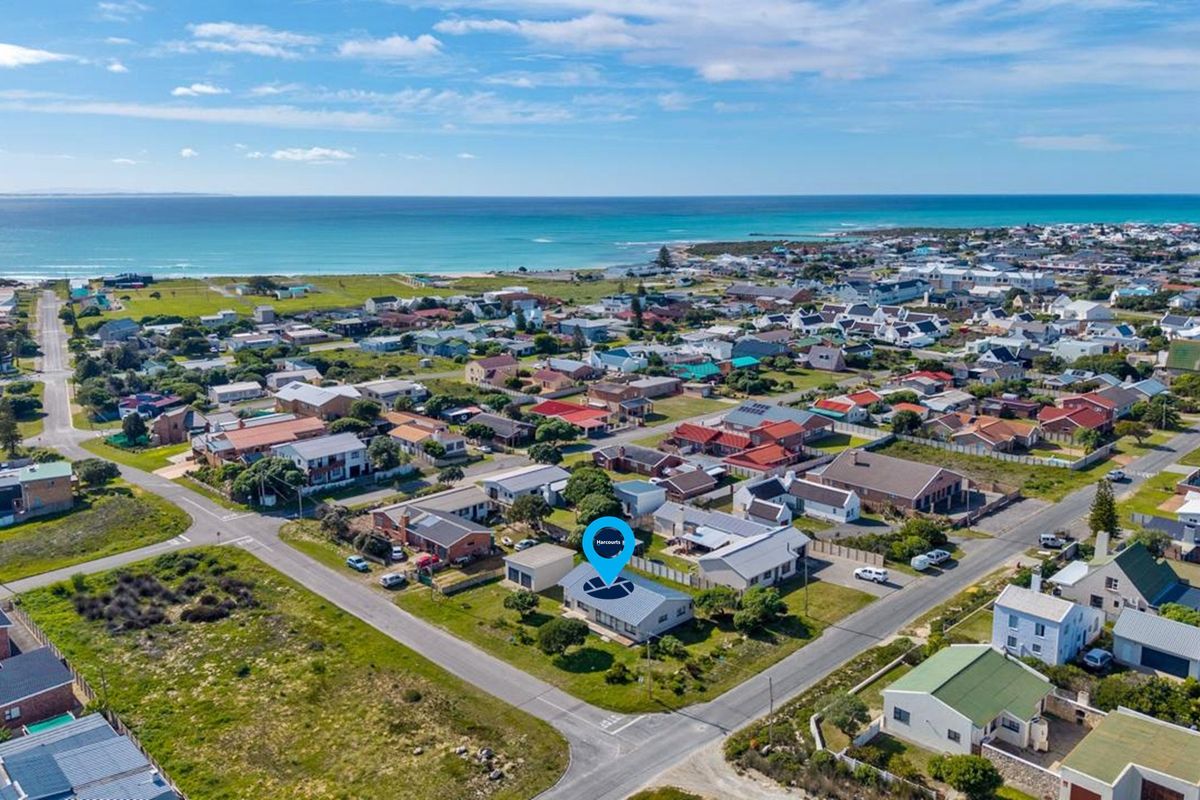 Aerial view of the property location within the coastal neighbourhood, highlighting proximity to the ocean and surrounding residential infrastructure.