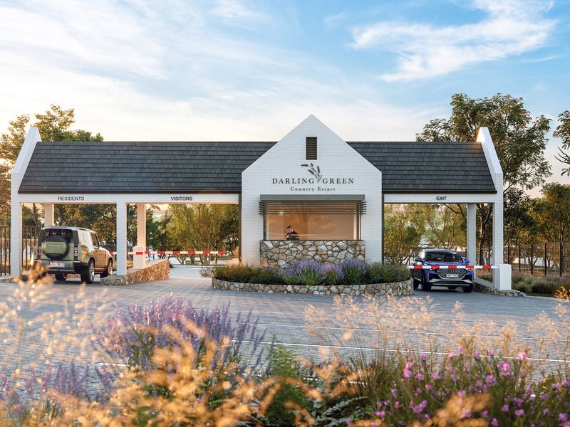 A professional rendering of the Darling Green Country Estate security entrance, featuring a modern gatehouse, boom gates, and landscaped surroundings.