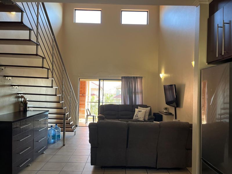 Stylish 3-Bedroom Double-Volume Home in Secure Solheim Complex - Photo 5