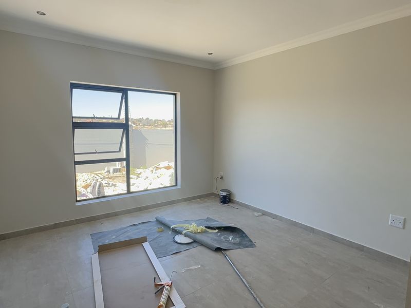 Exceptional Modern Living in a Newly Built 4-Bedroom Home - Photo 9