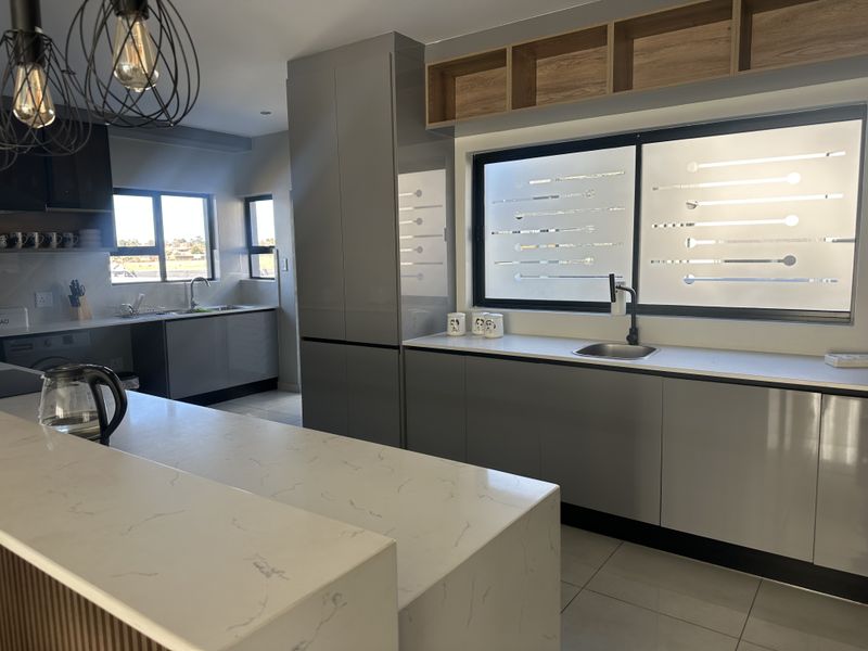 Exceptional Modern Living in a Newly Built 4-Bedroom Home - Photo 7