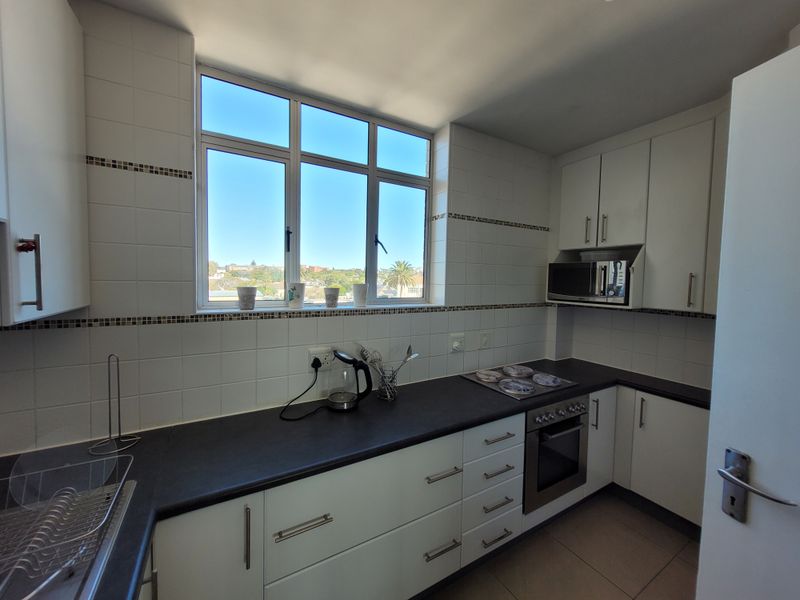 Furnished 2-Bedroom Apartment with Stunning Sea Views | Marine Towers - Photo 9