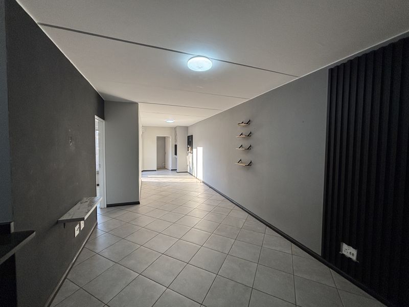 Modern, Secure & Energy-Savvy 2-Bedroom Home in Prime Brentwood Park Location - Photo 5