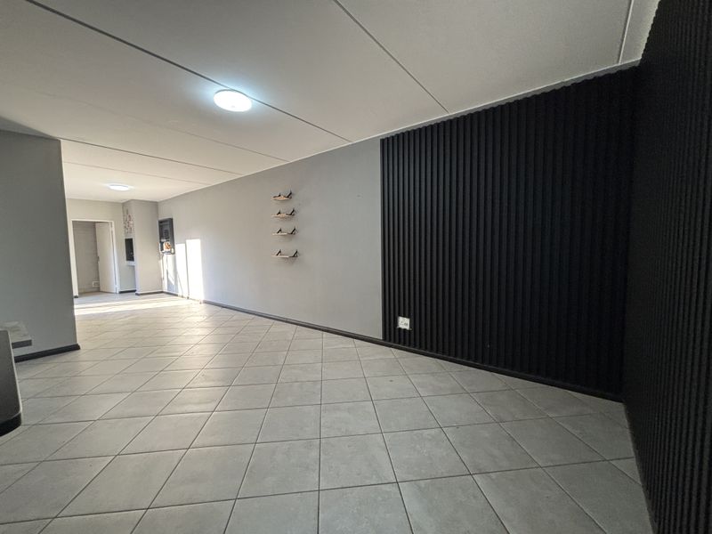 Modern, Secure & Energy-Savvy 2-Bedroom Home in Prime Brentwood Park Location - Photo 4