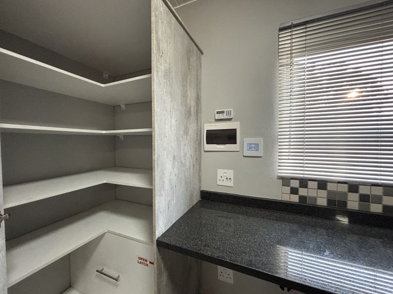 Modern, Secure & Energy-Savvy 2-Bedroom Home in Prime Brentwood Park Location - Photo 8