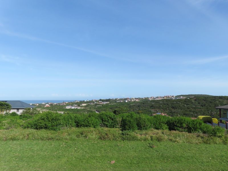 A scenic elevated view overlooking the surrounding coastal landscape and residential neighborhood.