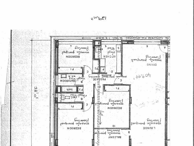 A detailed architectural floor plan showing the layout of a flat, including bedrooms, lounge, kitchen, bathroom, and balcony areas.