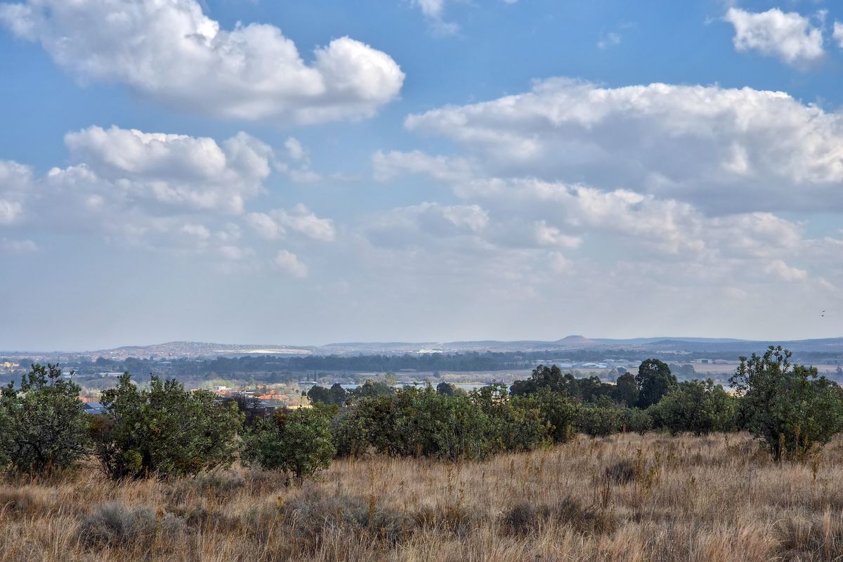 A scenic, elevated view overlooking the surrounding natural landscape and distant horizon.