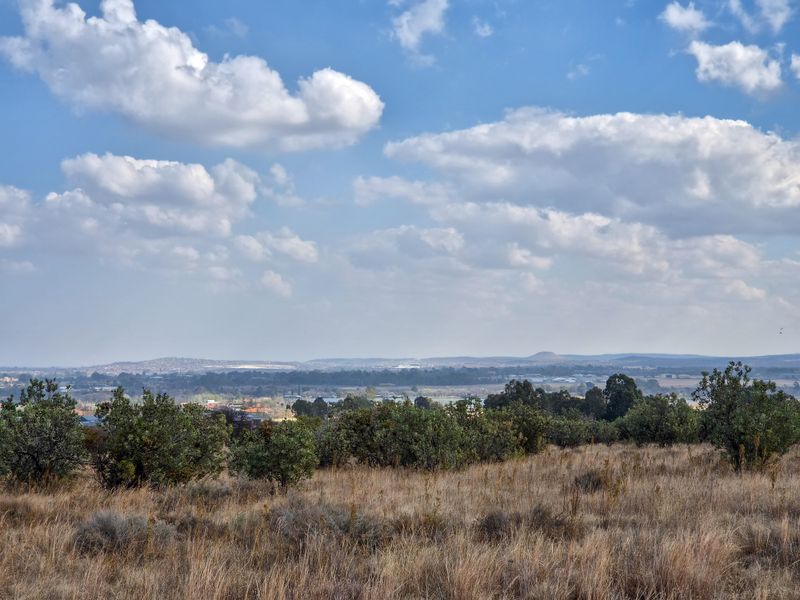A scenic, elevated view overlooking the surrounding natural landscape and distant horizon.
