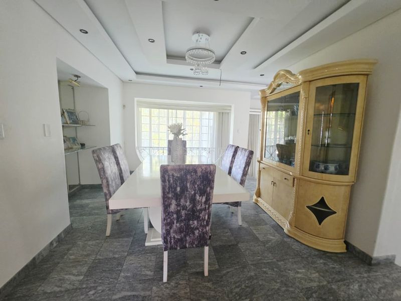 Spacious 7-Bedroom Home with Flatlet & Income Potential - Photo 9