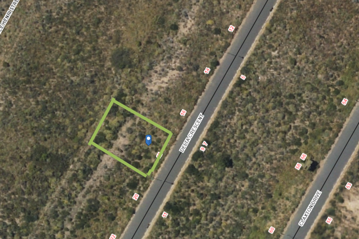 An aerial view of a vacant residential plot highlighting its boundaries and location along Delta Crescent.