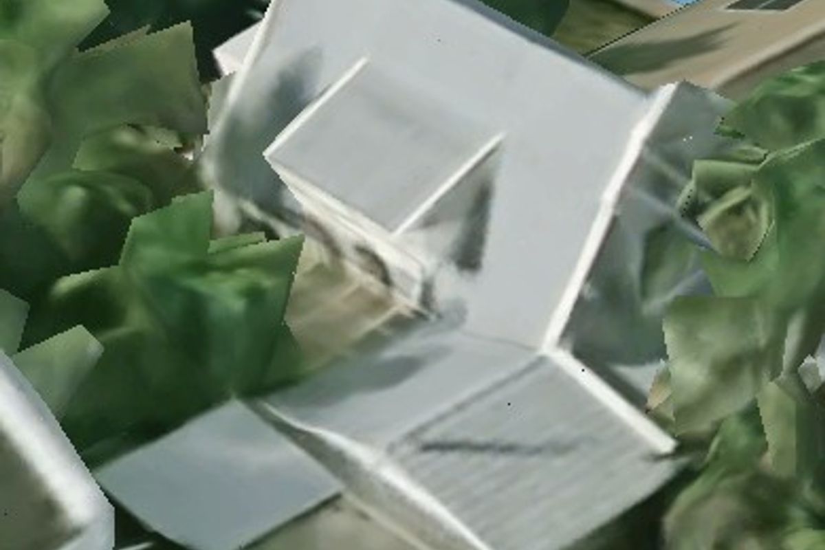 An aerial view of the property showing the roof structure, surrounding garden, and swimming pool.